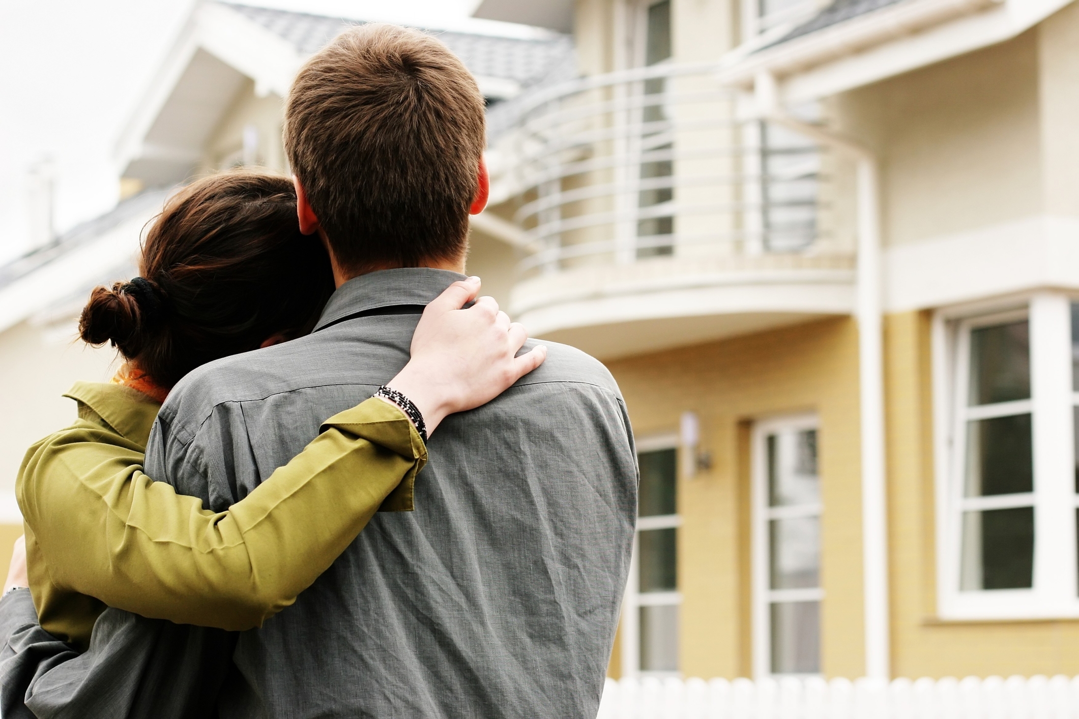 Couple looking at a house